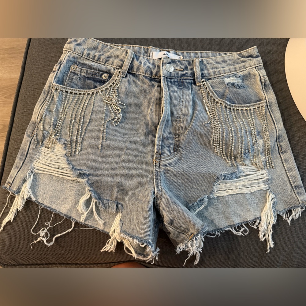 Size medium distressed sparkle fringe denim shorts